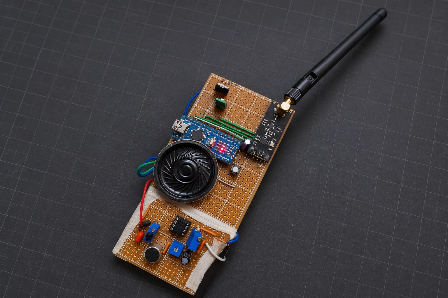 Enlarge an edited view of the TALK-E radio prototype on a workbench